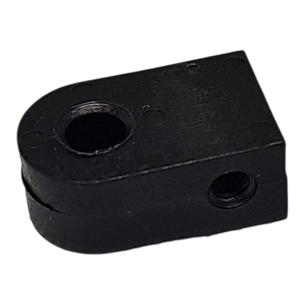 Black mechanical component on a white background